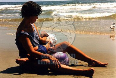 Beachside Breast Feeding - Copyright 2004 Birth Balance
