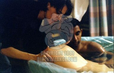 Mom and Dad in Tub, Doula Outside - Copyright 2004 Birth Balance