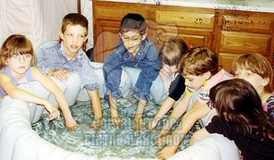 Kids in Pool - Copyright 2004 Birth Balance